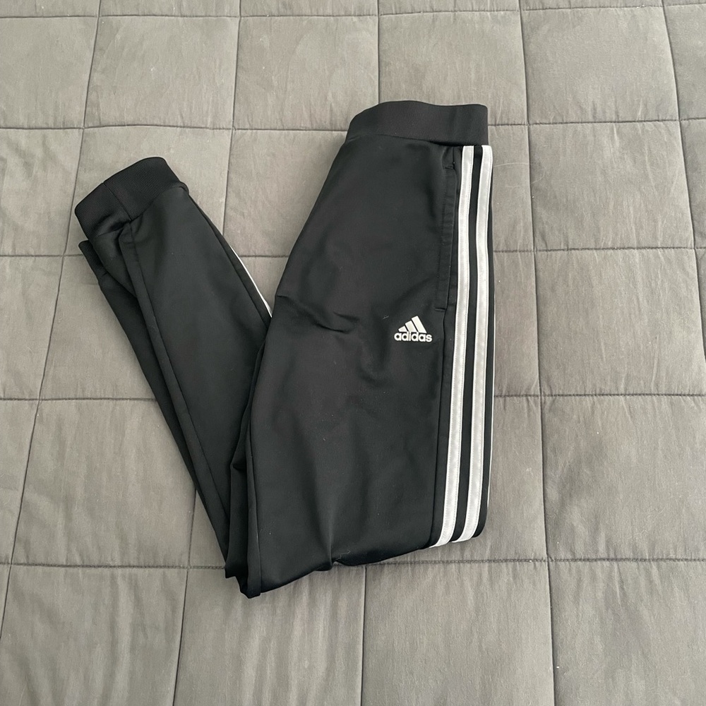 Girls Adidas joggers.